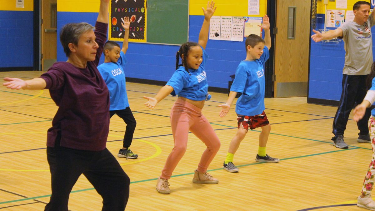 Students at Farmingdale Public School attend dance class with Laura Marchese.